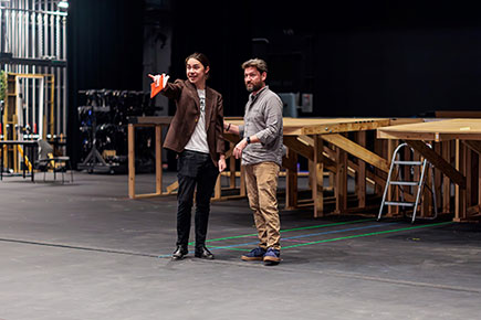Lone Star College-University Park Theatre Professor William Grayson directs Eian Garza during a rehearsal of Amadeus. The colleges drama department will perform the classic play on the Visual & Performing Arts buildings main stage at LSC-University Park on April 12-14 and April 19-21.