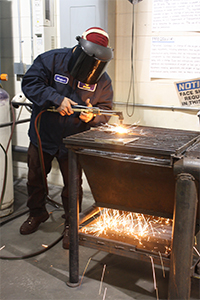 Wilfredo Martinez welding