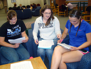 3 female students studying