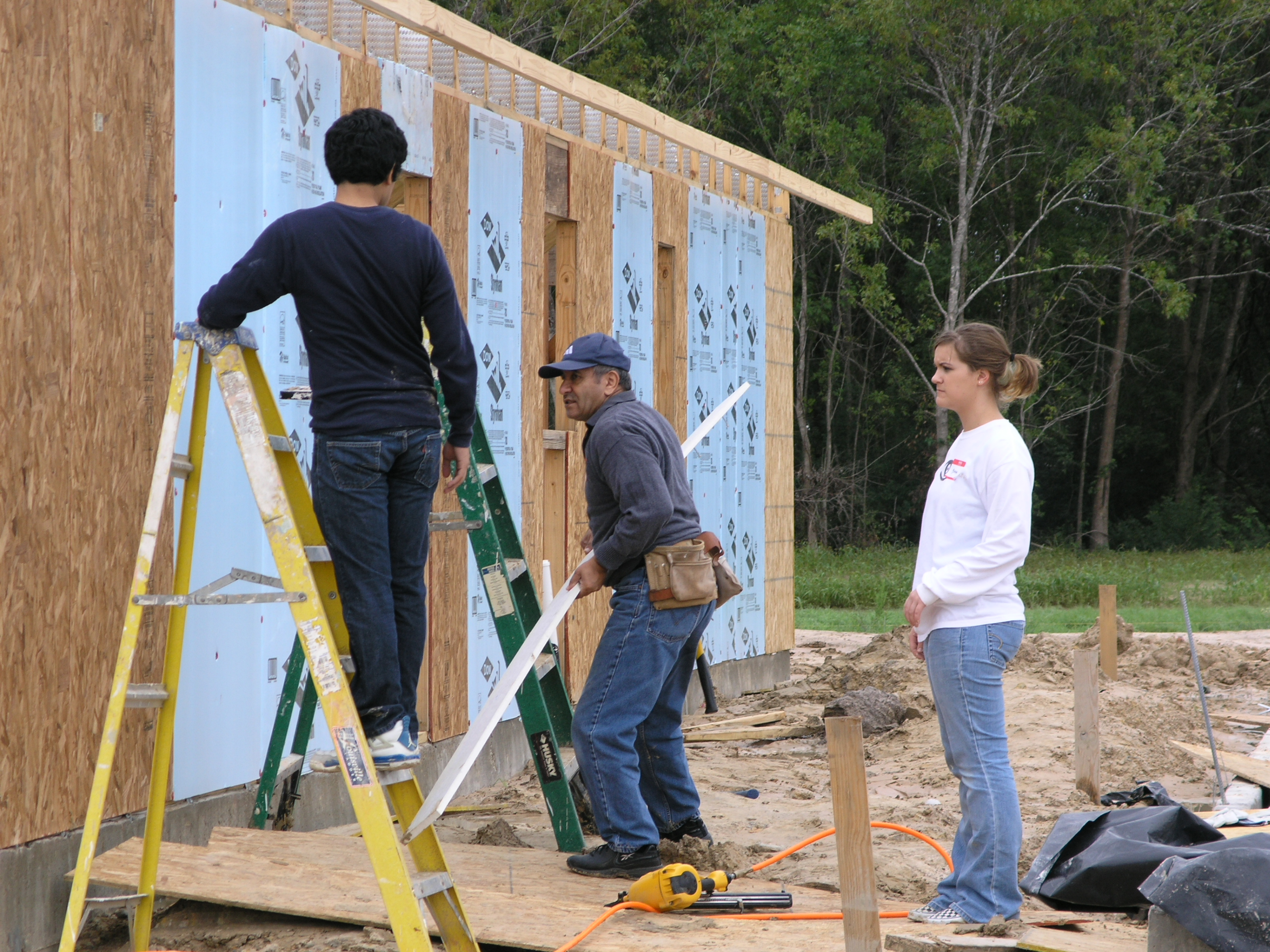 LSC-Montgomery participates in giving back to the community. 3 students building homes.