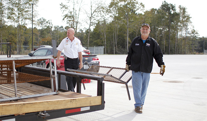 Welding faculty from Lone Star College-Conroe Center deliver donated prop furniture 