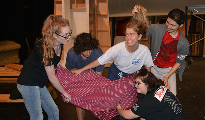 Actors rehearse scene from "The Miss Firecracker Contest"