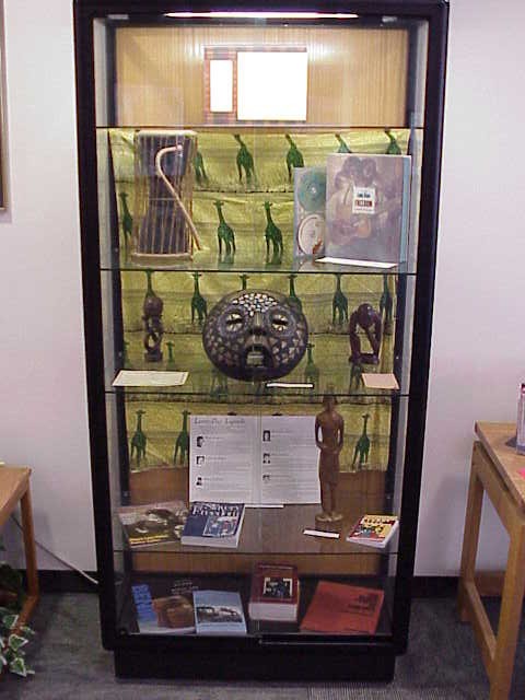 Several pieces of African art and relevant publications were displayed in the east cabinet.