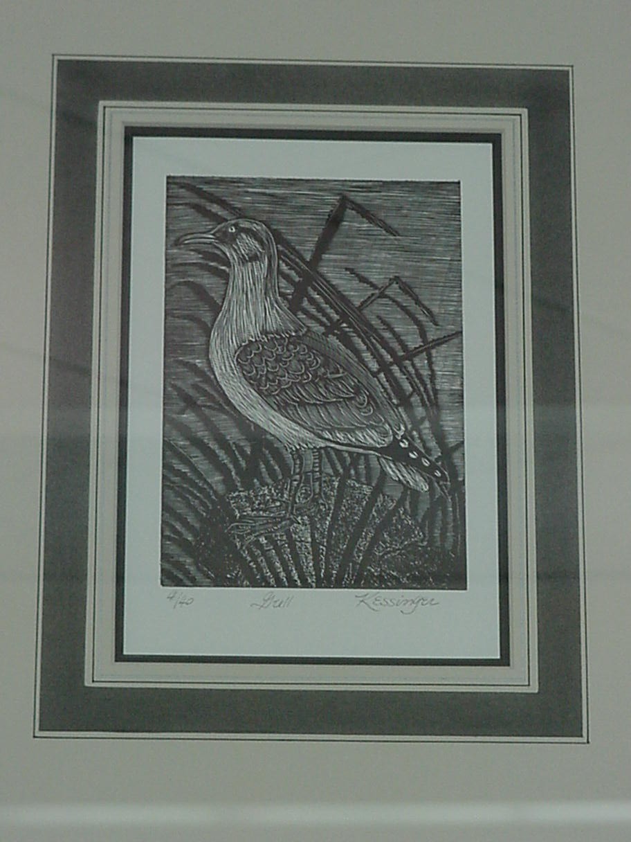 One of the dozen framed engravings hung in the library for the exhibit