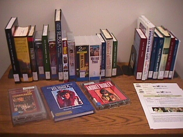 Some of the library's books and videos on Russia (as well as some on aging), available for check out, on a table next to the display case