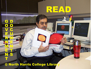 Director Lele reading a government document about space.