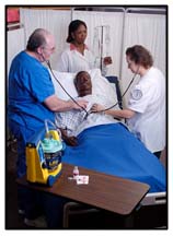 Nurses with patient