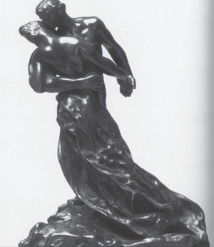 ebony statue of man and woman in arms