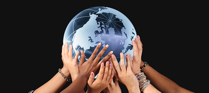 Hands holding globe