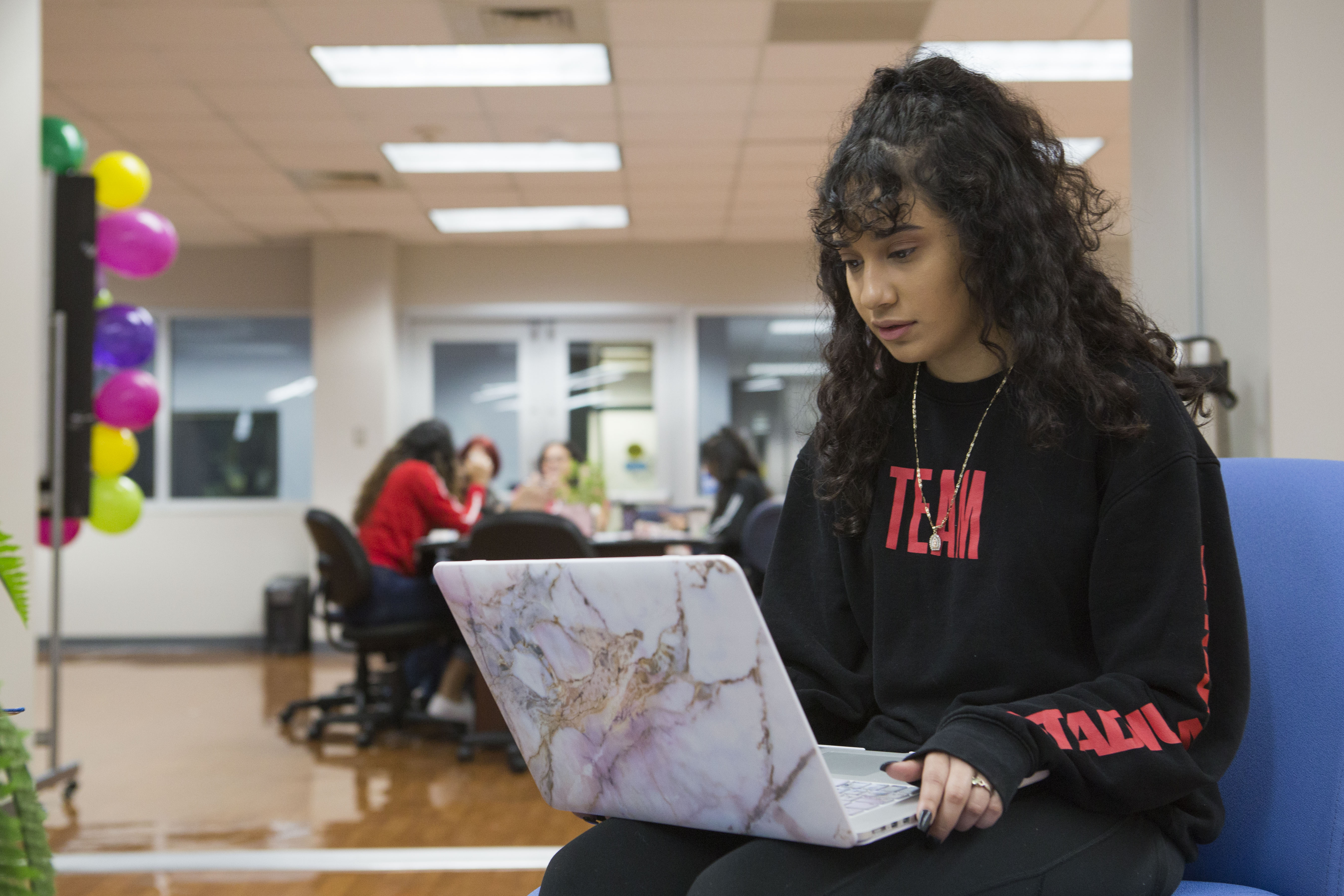 Photo of student using a laptop