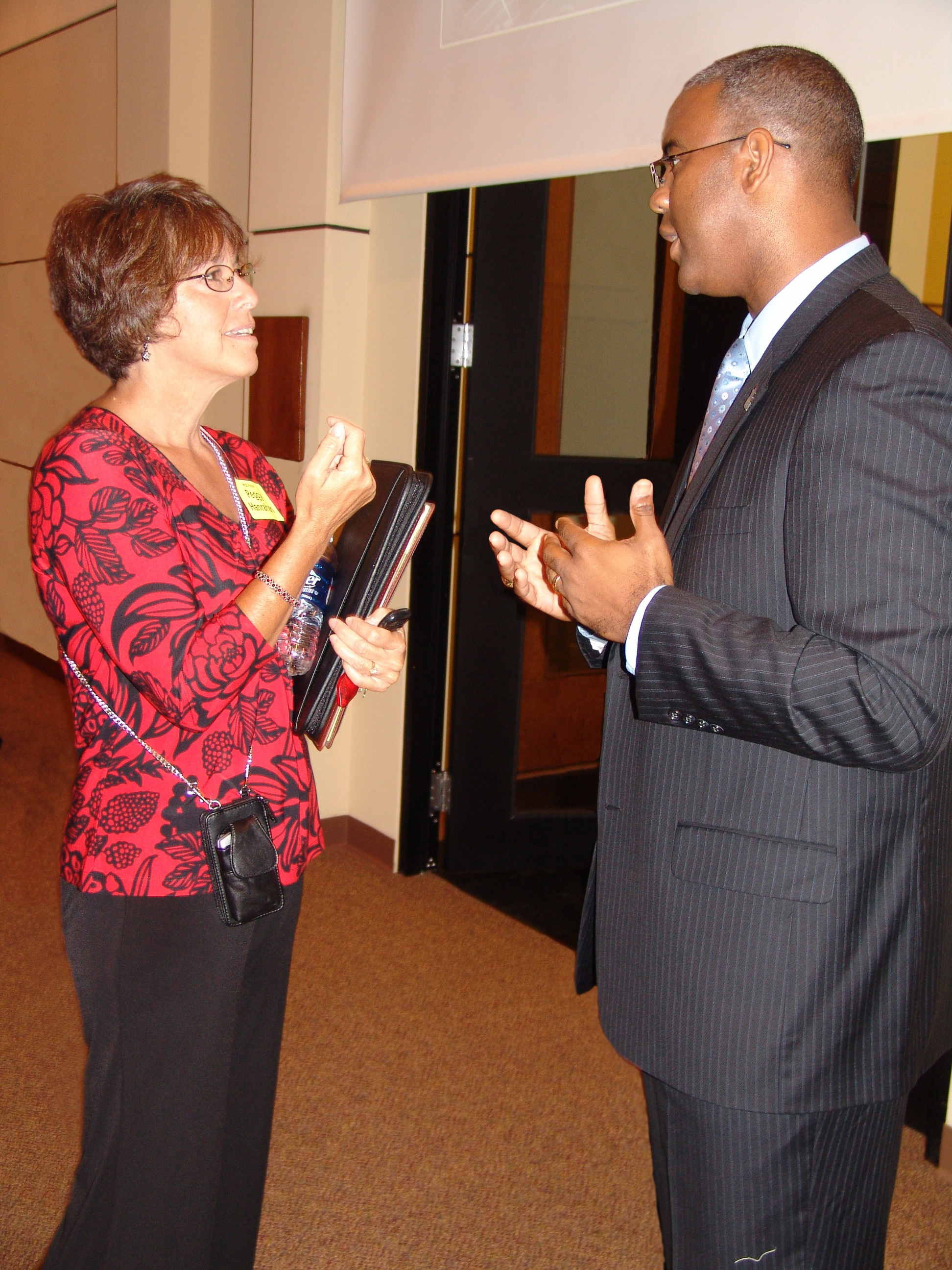 Dr. Austin Lane, president of LSC-Montgomery, visits with Peggy Hanrahan, a representative of the parents of Willis High School, after the first meeting of the LSC-Conroe Center Community Advisory Group. The meeting allowed Hanrahan and other group members an opportunity to provide their two cents for the vision of the new LSC-Conroe Center. 