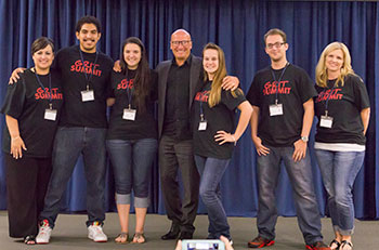 Lone Star College-Tomball president Dr. Lee Ann Nutt (far left) and Dr. Paul G. Stoltz (center) pose with LSC-Tomball students at last years GRIT Summit. The second annual event will be held at LSC-Tomball on October 13.