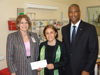 Officials from Memorial Hermann The Woodlands Hospital recently presented a check to the Lone Star College-Montgomery nursing program in order to fund a faculty position and allow the college's nursing program to continue to expand, meeting the critical need for nurses in the area. Pictured (l. to r.) are Glenda Cox, chief nursing officer at Memorial Hermann The Woodlands Hospital; Manijeh Azhang Scott, director of the LSC-Montgomery nursing program; and Dr. Austin A. Lane, president of LSC-Montgomery