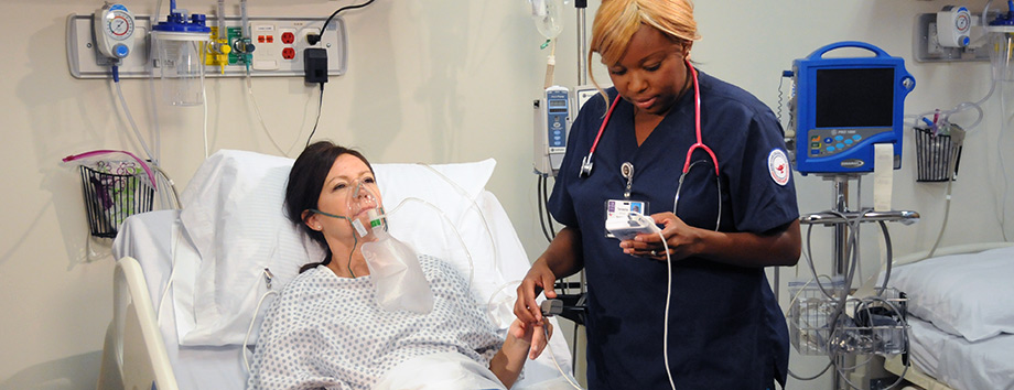 Nurse workinf with a patient.