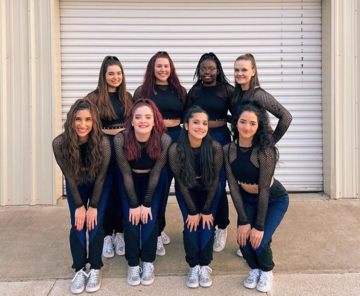 Group Photo of the LSC-CyFair Dance Team in black tops and blue jeans