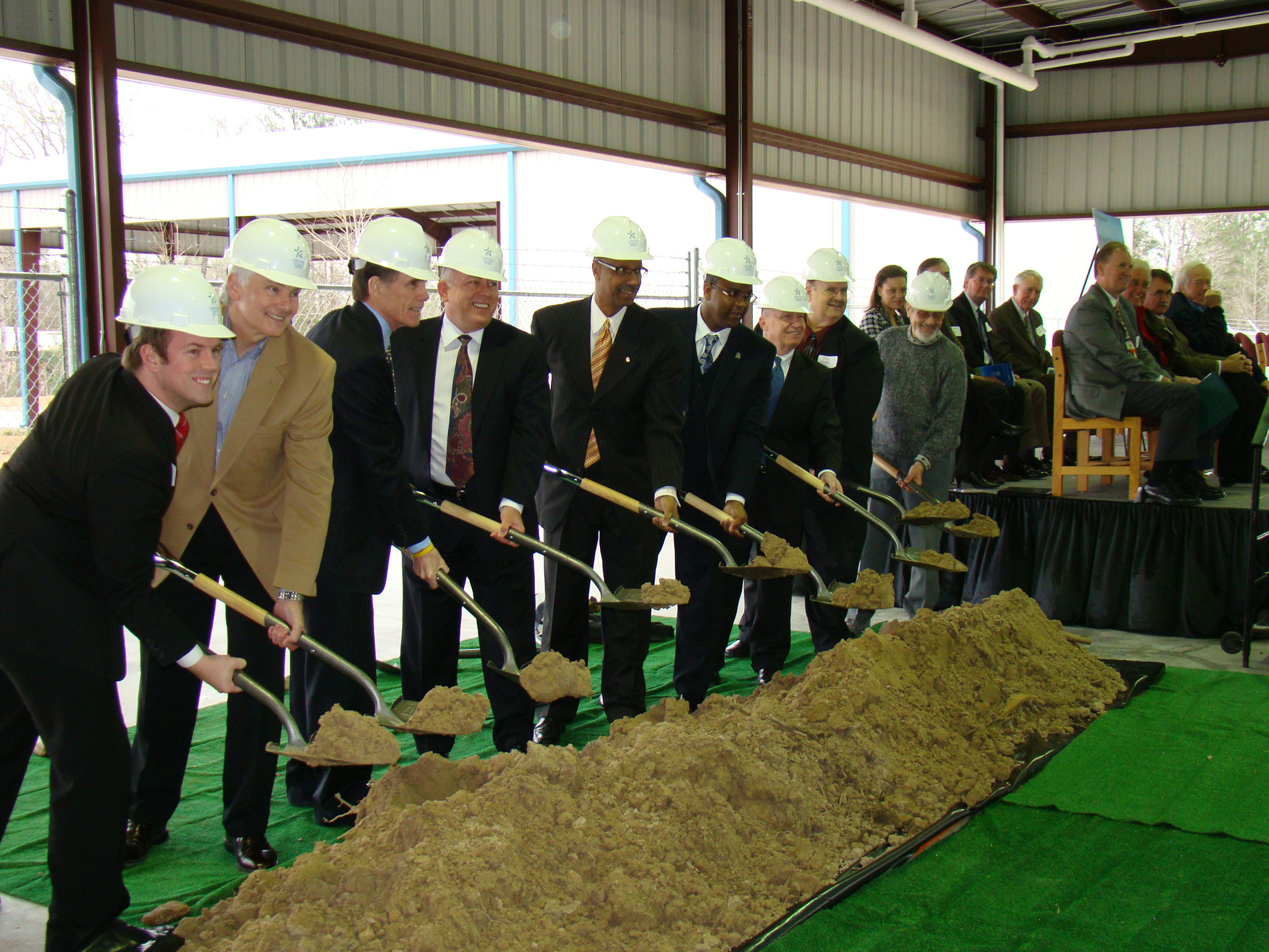 Community officials dig in at the groundbreaking ceremony for the new Lone Star College-Conroe Center campus. Pictured from left to right are: Mike Barnhill, vice chair of the Greater Conroe Economic Development Council; Roy Morton, chair of the Greater Conroe/Lake Conroe Area Chamber of Commerce; Dr. Richard G. Carpenter, chancellor of LSCS; Dr. Austin A. Lane, president of LSC-Montgomery; Alan Barb Sadler, Montgomery County Judge; and Webb Melder, mayor of the City of Conroe.