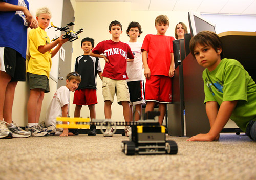 A group of future engineers test out some of their very own LEGO robotic creations during Discovery College, a fun and exciting summer enrichment program for youth at Lone Star College-Montgomery.