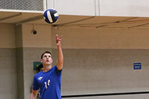 Photo of volleyball player serving