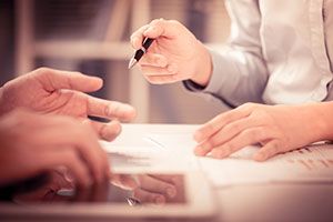 Photo of man filling out form