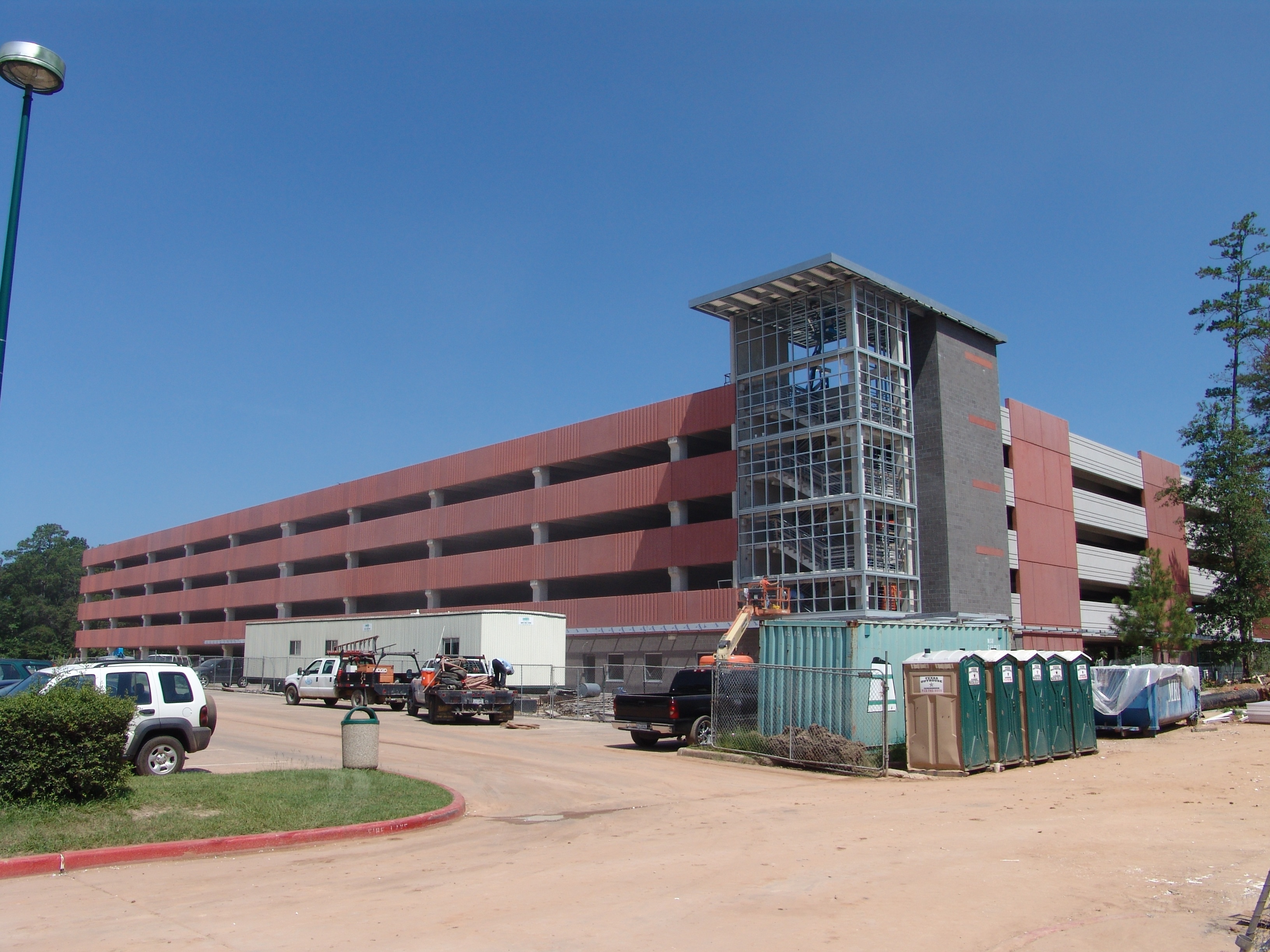 Workers are putting the finishing touches on Lone Star College-Montgomerys brand new, five-level parking garage, which will be open for students, faculty, and visitors on August 30, the first day of the fall semester.  