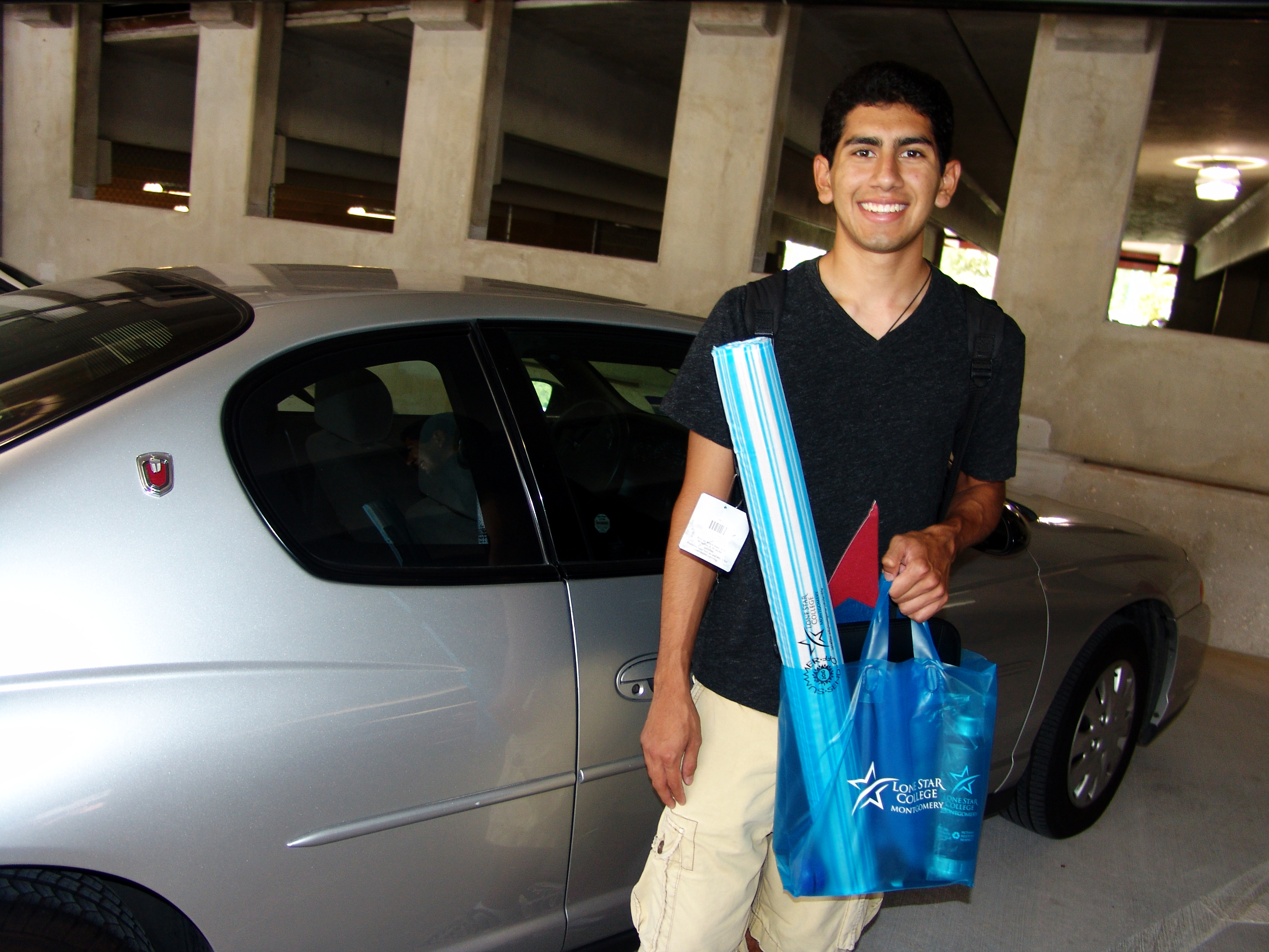 Daniel Gonzales, a student at Lone Star College-Montgomery, was the first to park in the colleges new 1,000-space, five-level parking garage, which opened on the first day of the fall semester. More than 12,500 students are enrolled at LSC-Montgomery this fall.