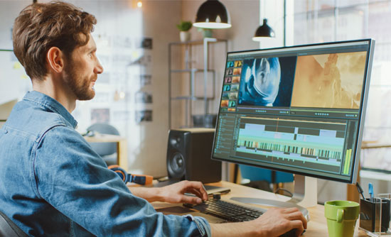 Man using video production software