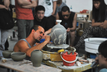 Robby Wood, ceramics professor at Lone Star College-Montgomery, recently conducted a pottery demonstration for members of The Pottery Workshop, an international ceramics center located in Jingdezhen, China.
