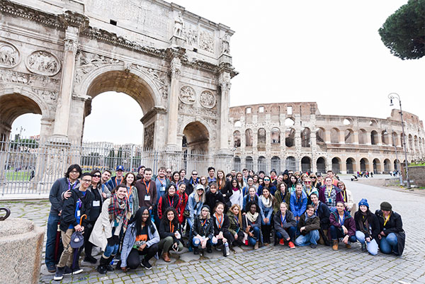 Honors College students in front of the colesium