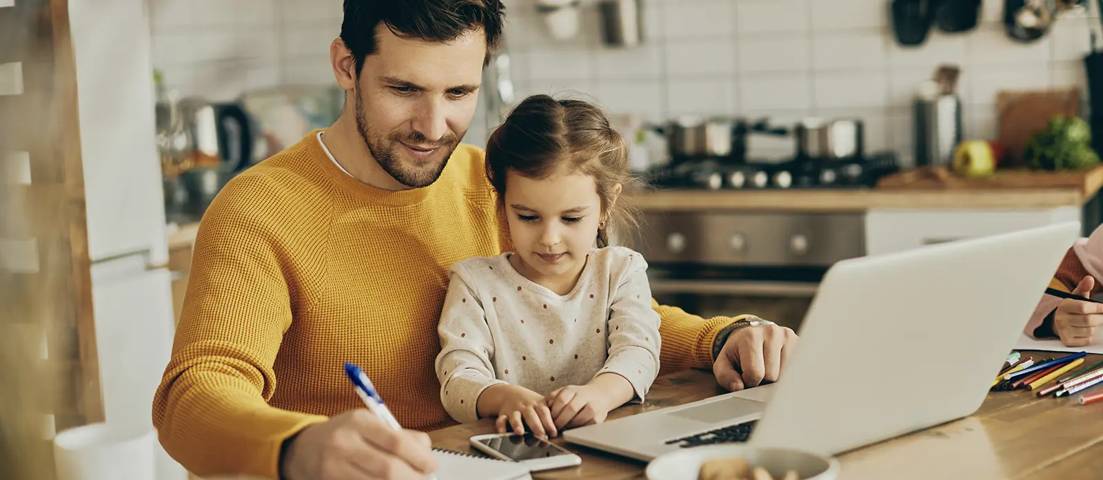 Man with Child at Computer