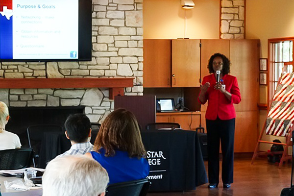 Woman speaking at The Center event