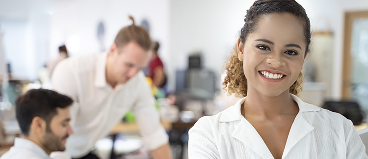 Smiling woman in workplace