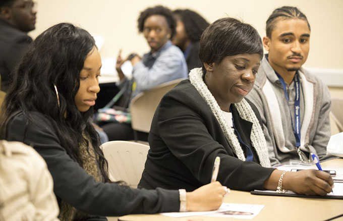 Group of students working at conference