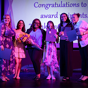 SSI Students taking a photo after receiving their awards at the Student Excellence Awards Ceremony, from their SSI Coordinator.