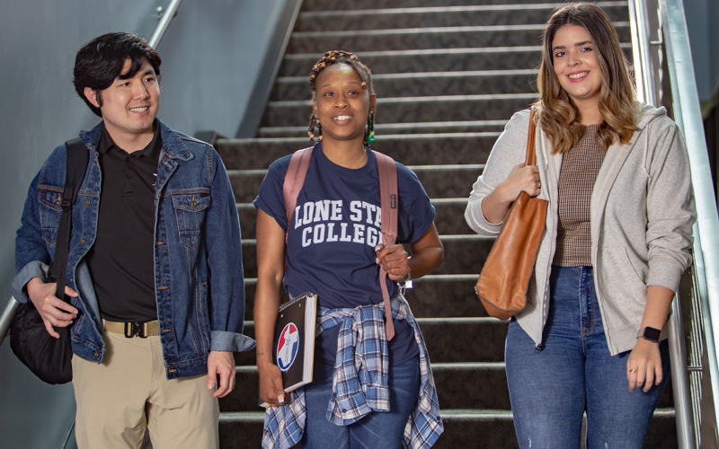 Students walking down the stairs together. 