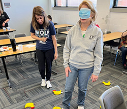 Employees play team building games 