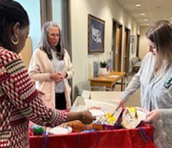 Emplouyees Cutting the King cake