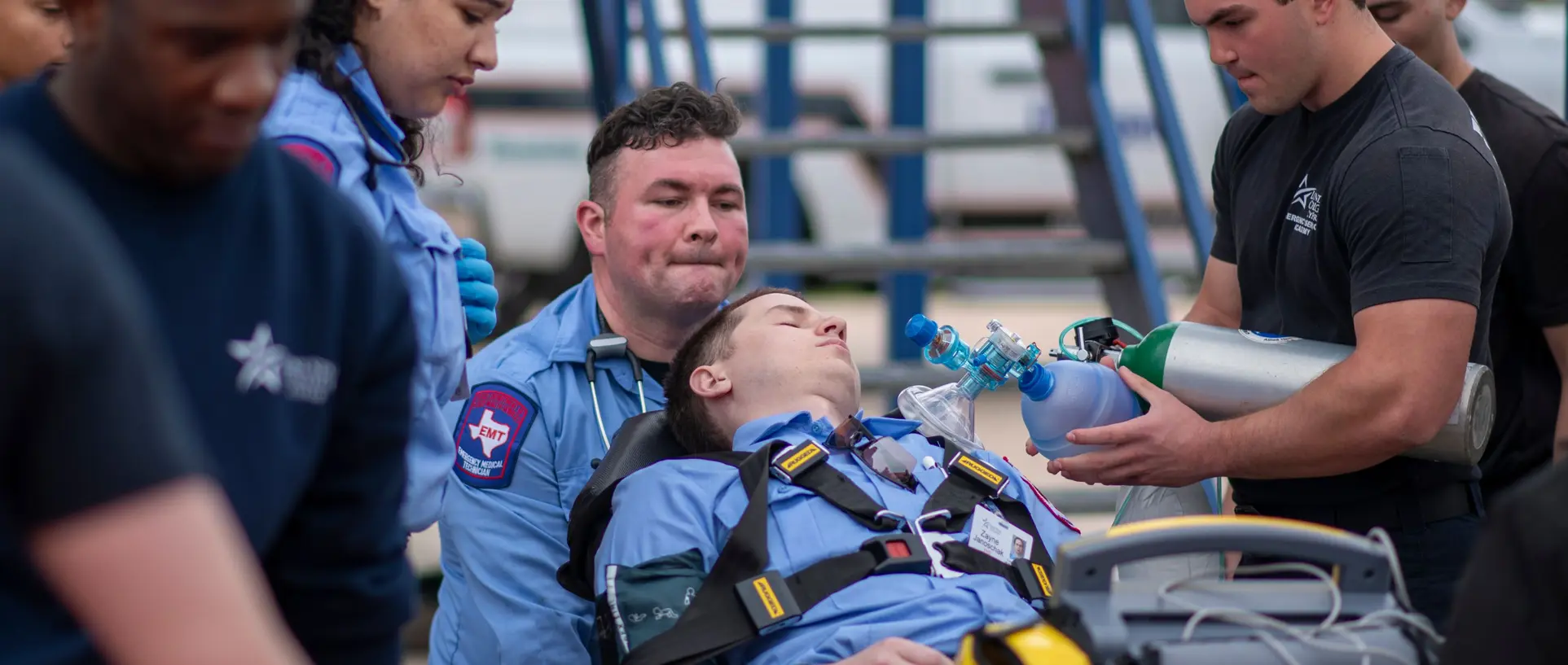 Students participating in a simulated emergency response situation