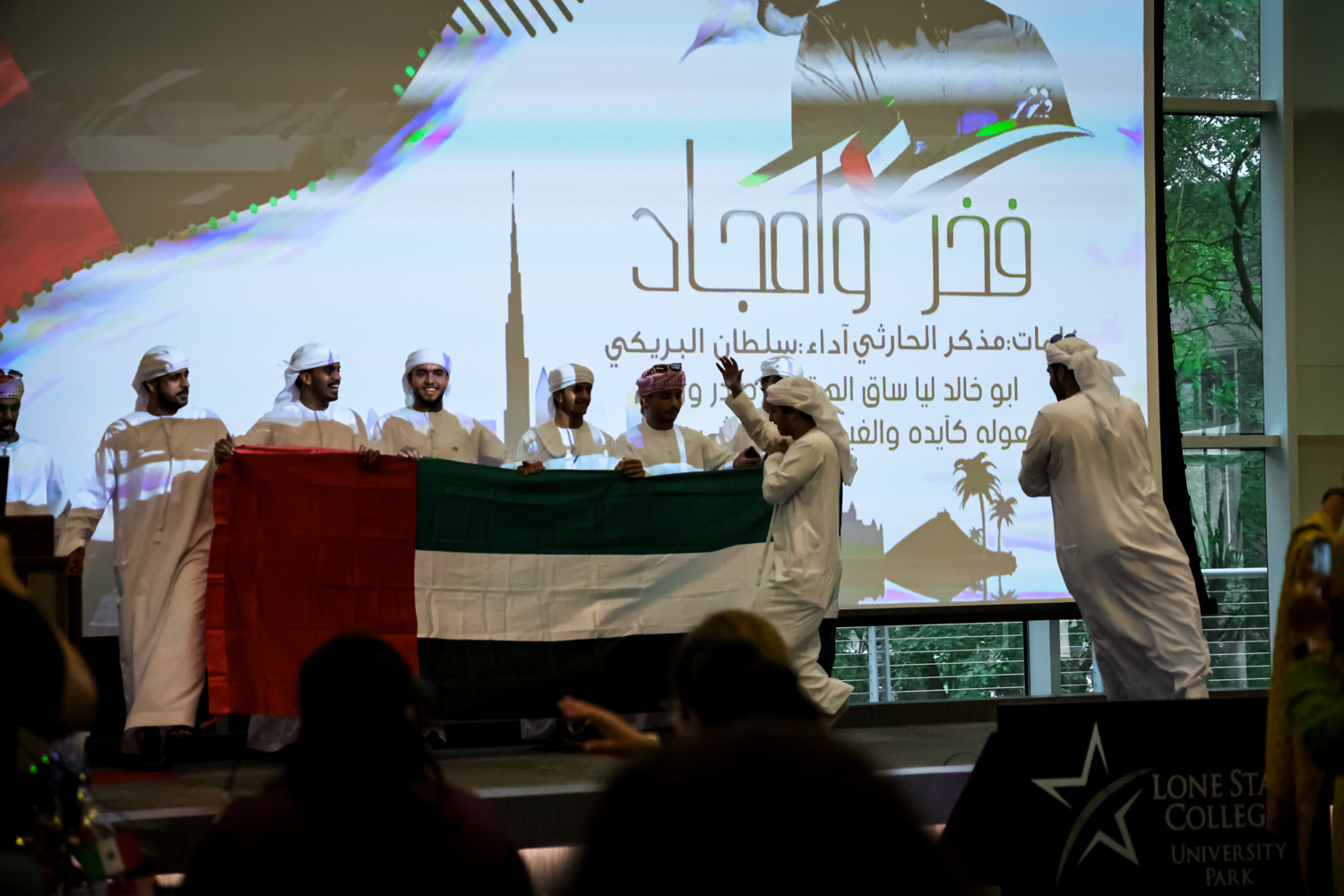 A group of out Arab students showing pride for the 2024 Windows to the World event