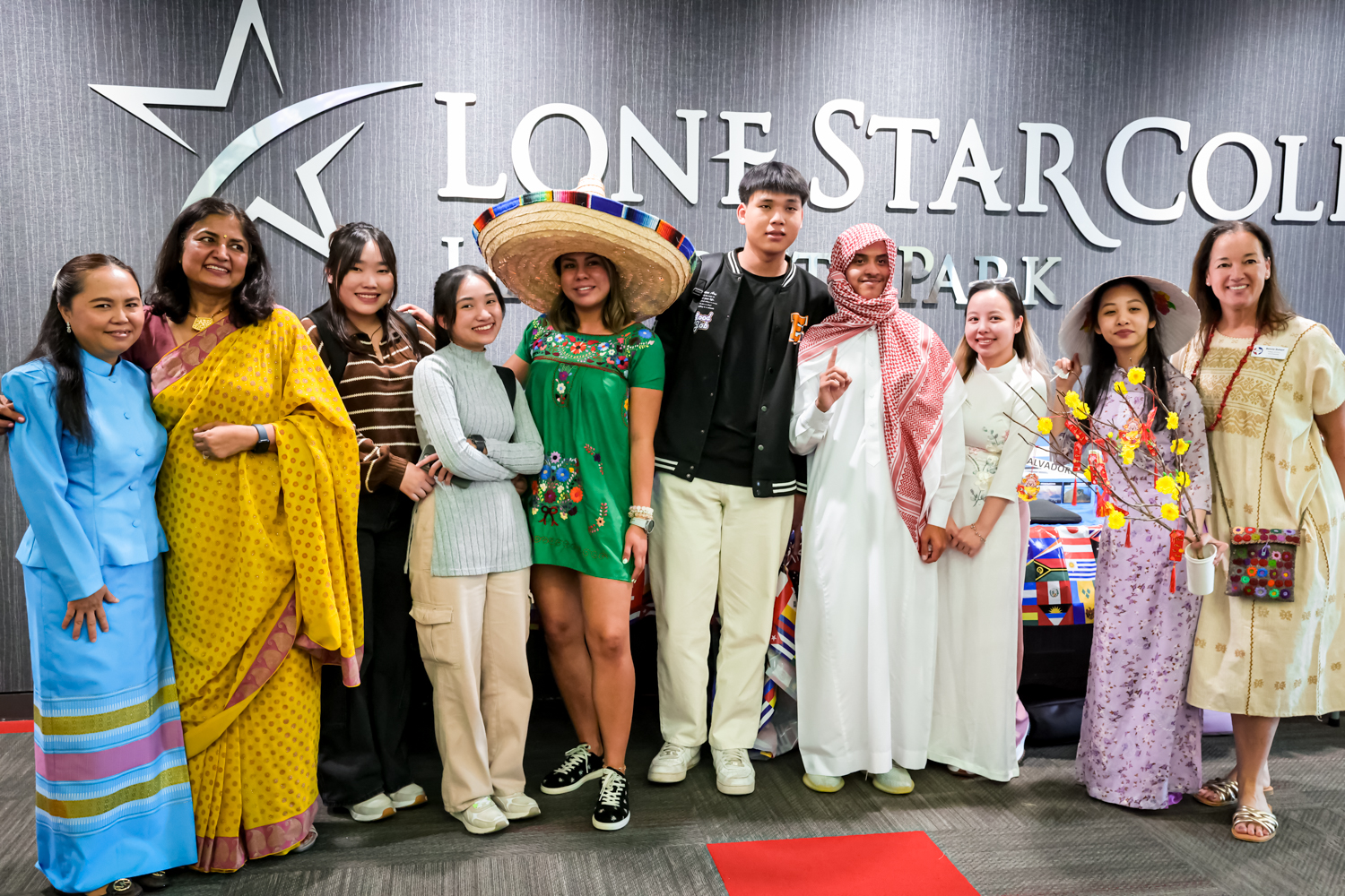 A group photo of students and faculty members from diverse communities