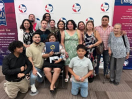 Certificate recipient Reina Zelaya with Family