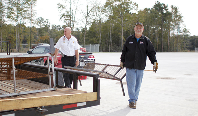 Welding faculty from Lone Star College-Conroe Center deliver donated prop furniture