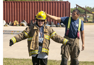 Trying on fire gear