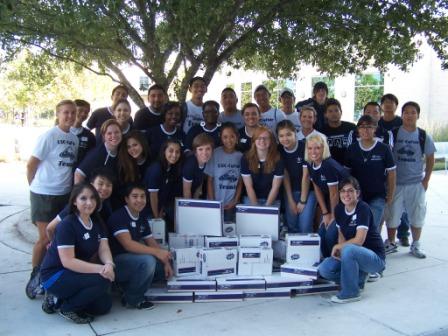 Students surround care packages