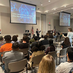 Photo of a speaker presentation