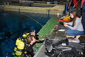 Francesca briefs the divers