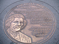 Photo of a plaque commemorating Frederick Douglass