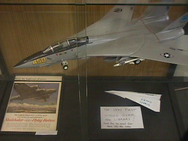 ad, model, and the very first paper airplane flown in the library