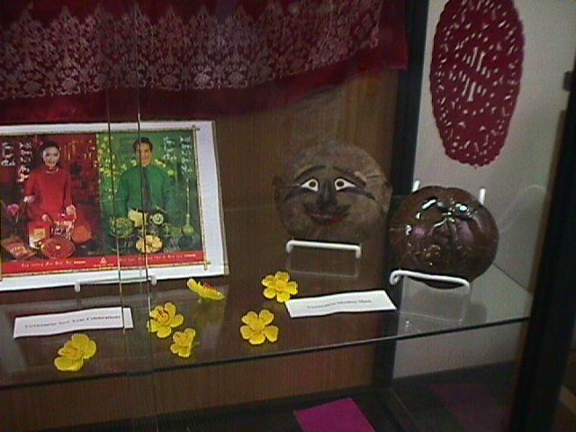 Detail of the east cabinet, with Vietnamese Monkey masks and images