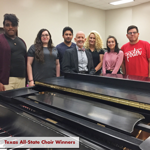 Choral Director and Students gathered around a piano