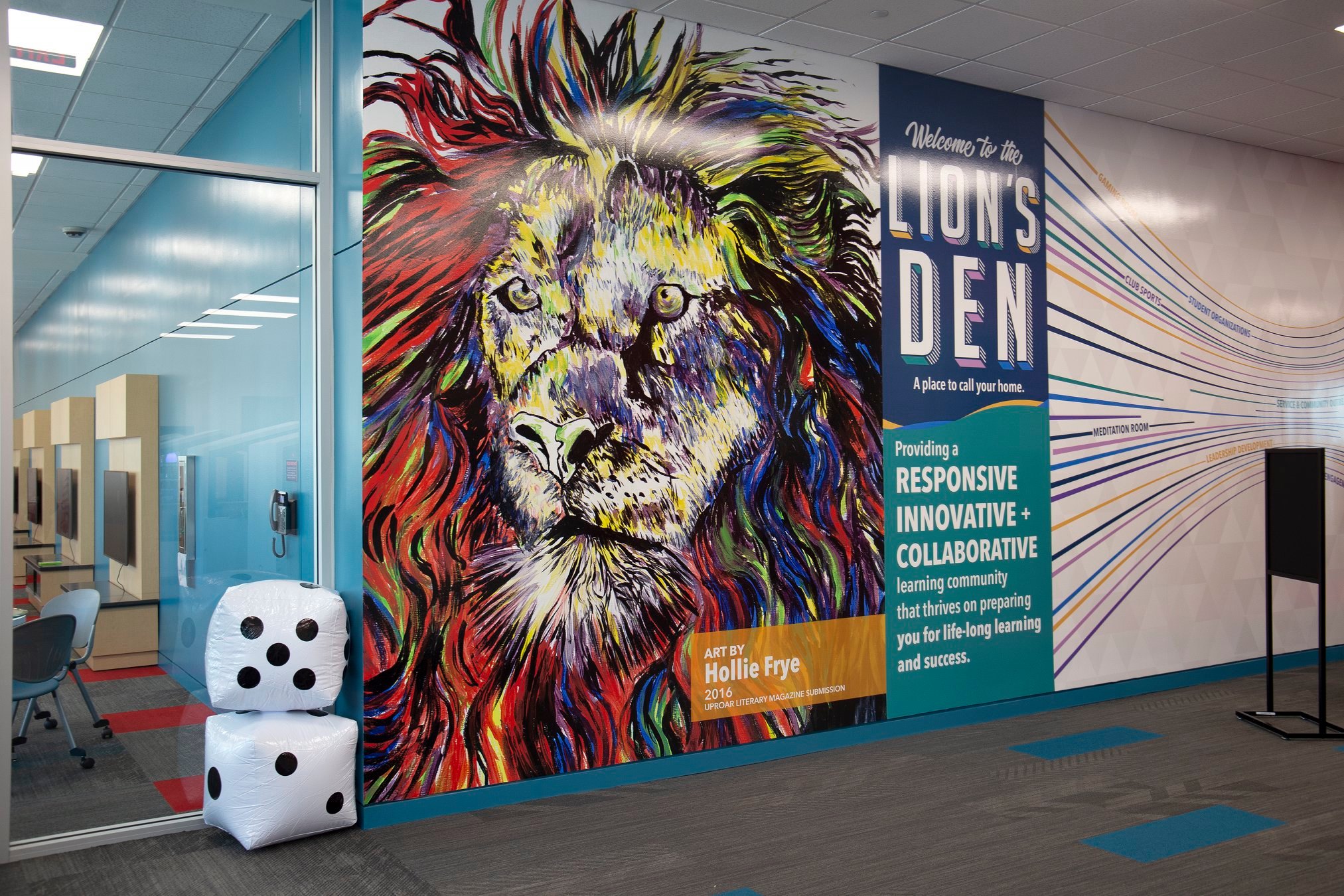 The Lion's Den Mural outside of meeting space